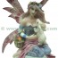 figurine de f&eacute;e avec lapin sur boule en verre